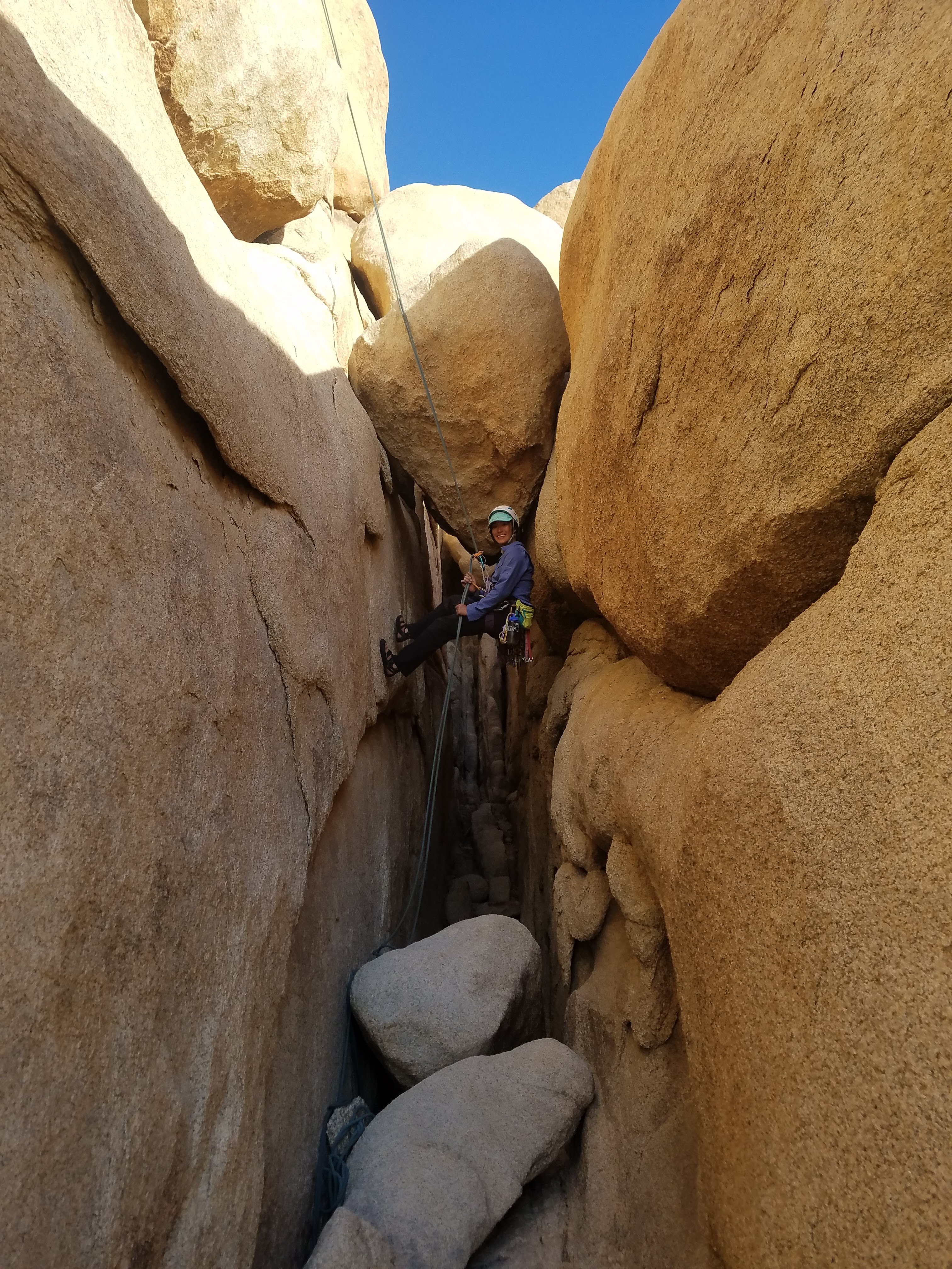 Rappeling off the otherside of Outhouse Rock after Geoff climbed Straight Flush.