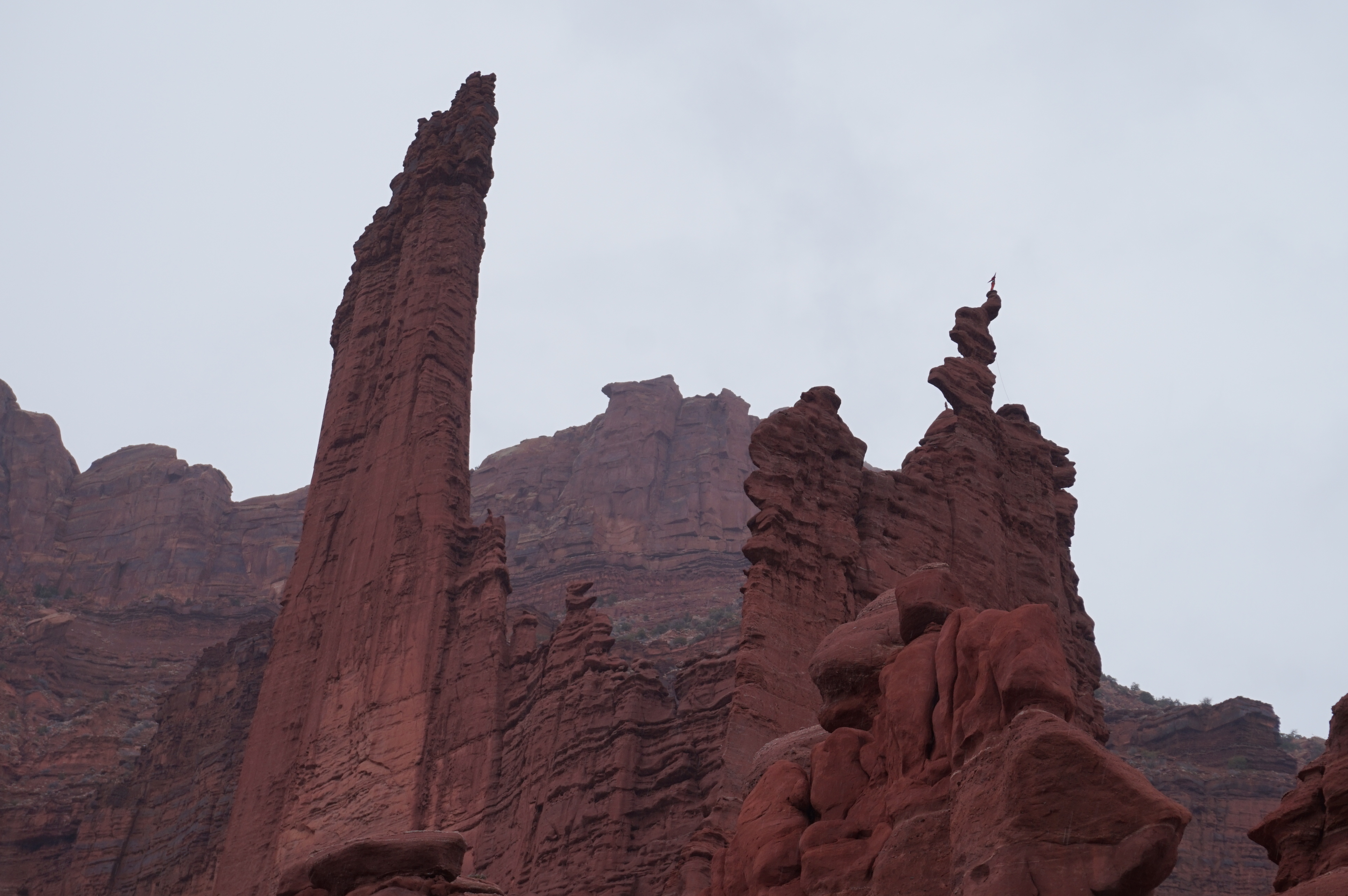 Climber toping out on Ancient Art.