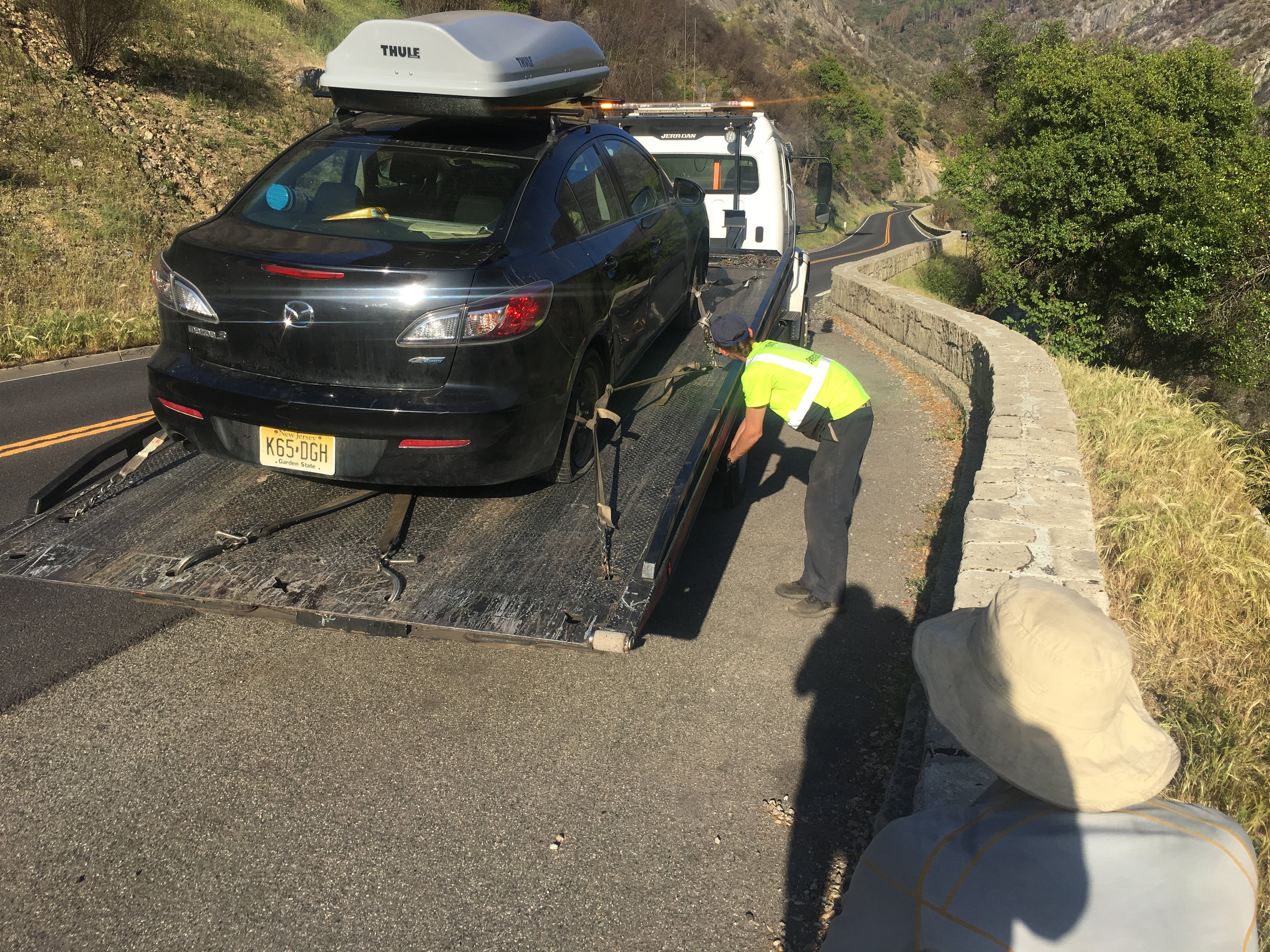 There is no shoulder on this narrow road from El Portal to Yosemite. Apparently, this happens to a lot of people (gorgeous views + narrow road + sharp curb = flat tires). The Yosemite Valley Garage and Kathy, the hotel operator, are heroes. We were able to get back on the road within a week.