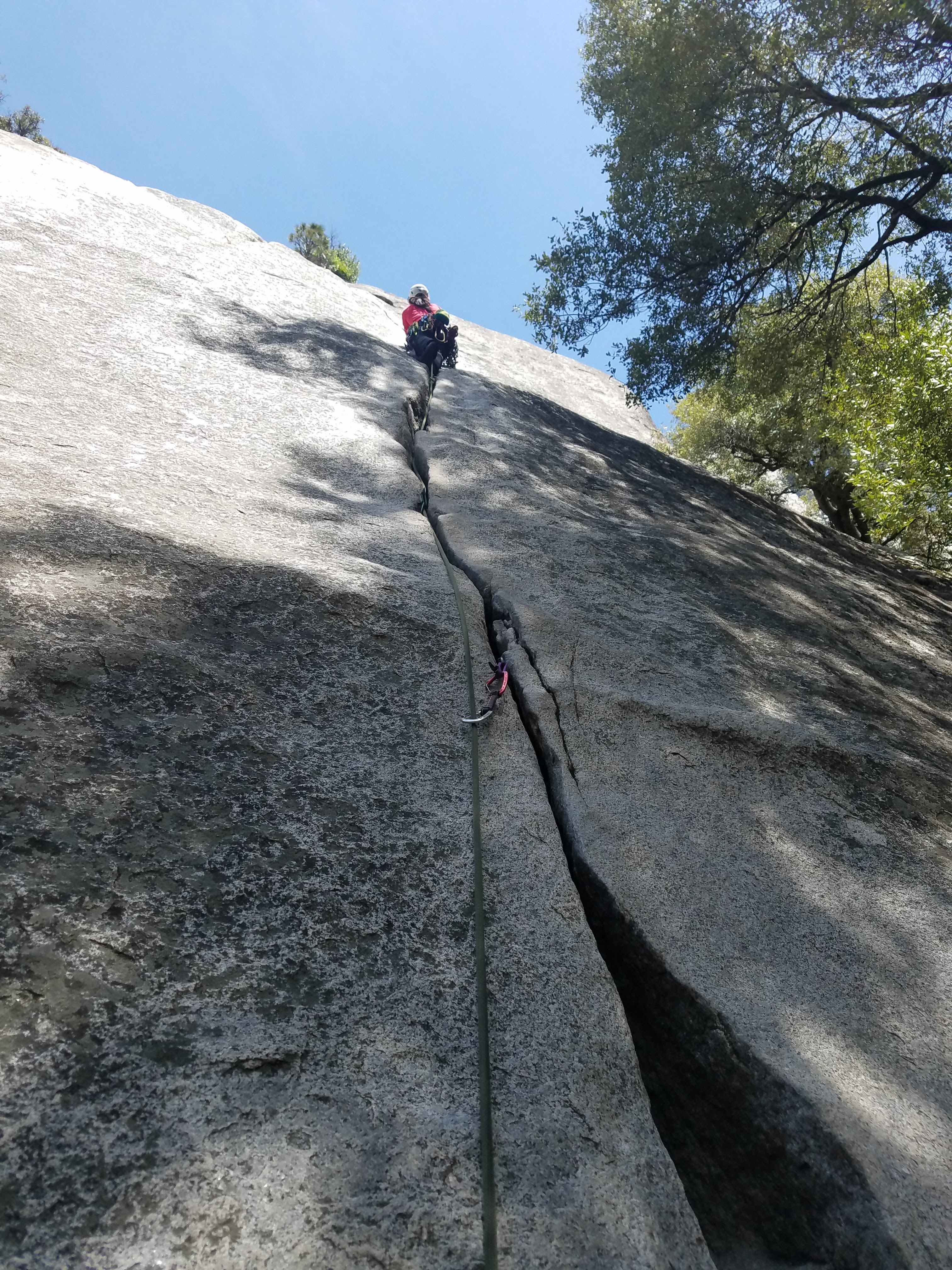 One of our Camp 4 neighbors had a book titled <i>The Crack Climber's Technique Manual</i> which I pretty much read in one night. I'm completely new to crack climbing, and this trip (especially Joshua Tree and Yosemite) has featured nothing but cracks. My favorite quote from the book is: ''Face climbing is climbing what is there. Crack climbing is climbing what is NOT there.'' So true. Crack climbing is just not intuitive. This is me leading Jam Crack, which I think is the first time I actually enjoyed climbing crack. My toes didn't hurt too much, the placements were easy, and the hand jams were solid.