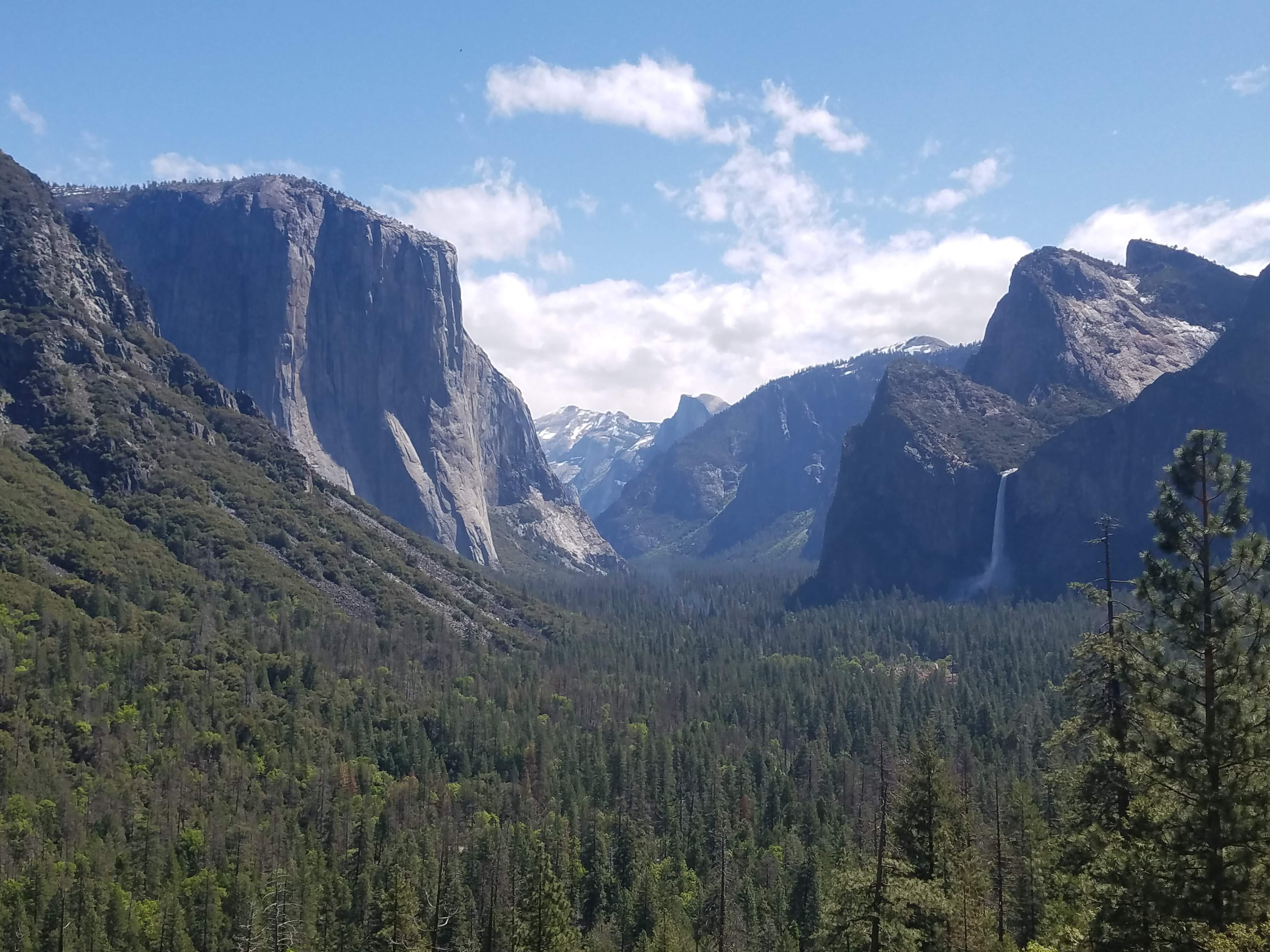 The grand reveal from Tunnel View. Driving from Wawona, you enter a tunnel which spirits you to this magical valley view. Bridalveil Fall, Half Dome, Glacier Point, and El Cap can be seen here. 